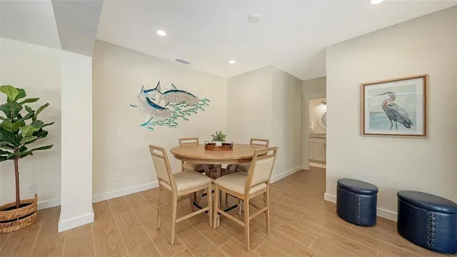 a bedroom with a bed and a night stand