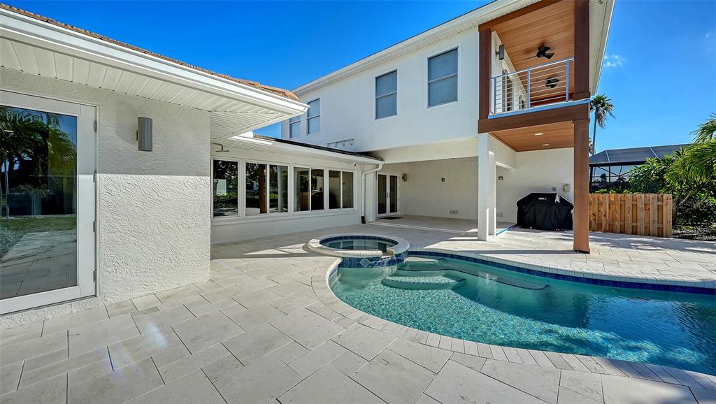 690 Old Compass Road Longboat Key, FL 34228 - Photo 56 of 69 a view of a building with tub and mirrors