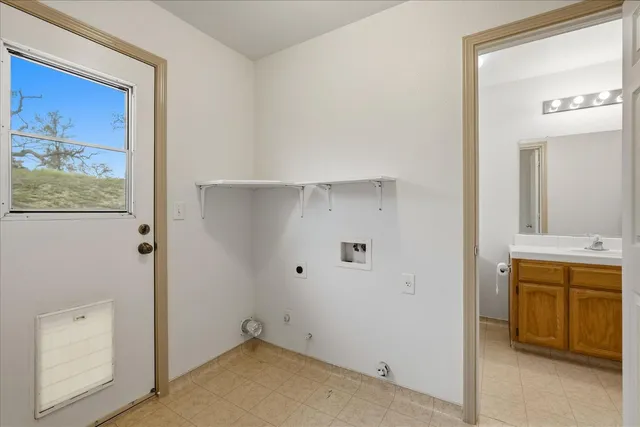 a bathroom with a granite countertop sink toilet a large mirror and shower