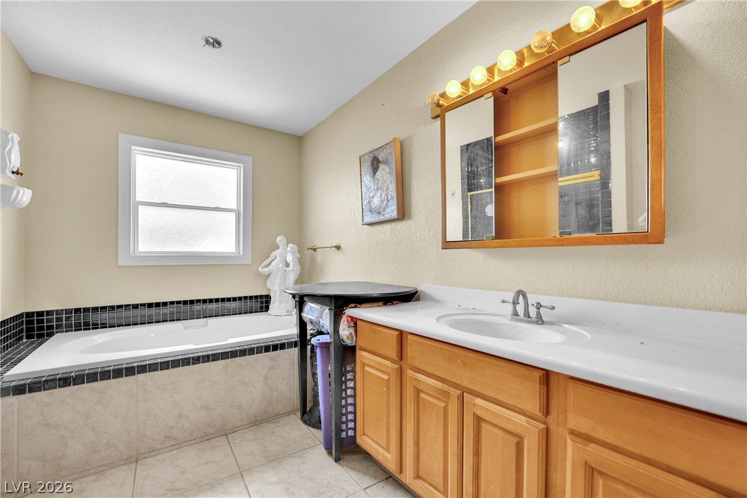 420 North Racetrack Road Henderson, NV 89015 - Photo 32 of 52 Indulge in a tranquil bathing experience with this spacious built-in tub.