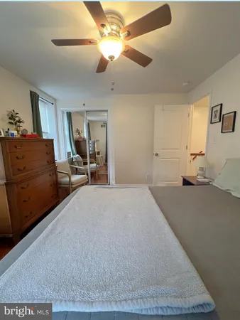 a bed room with a bed and a couch