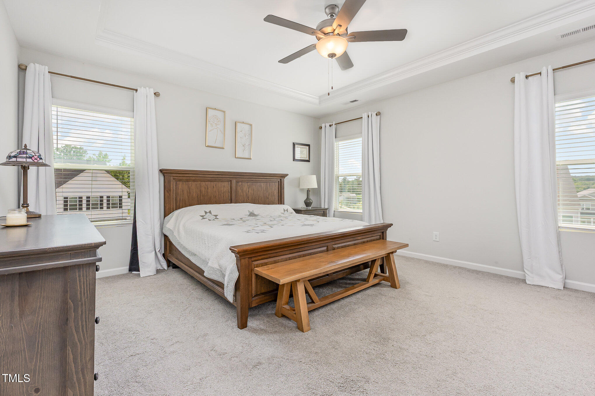 1101 Hazelmist Drive Wake Forest, NC 27587 - Photo 12 of 28 a bedroom with a bed and a window