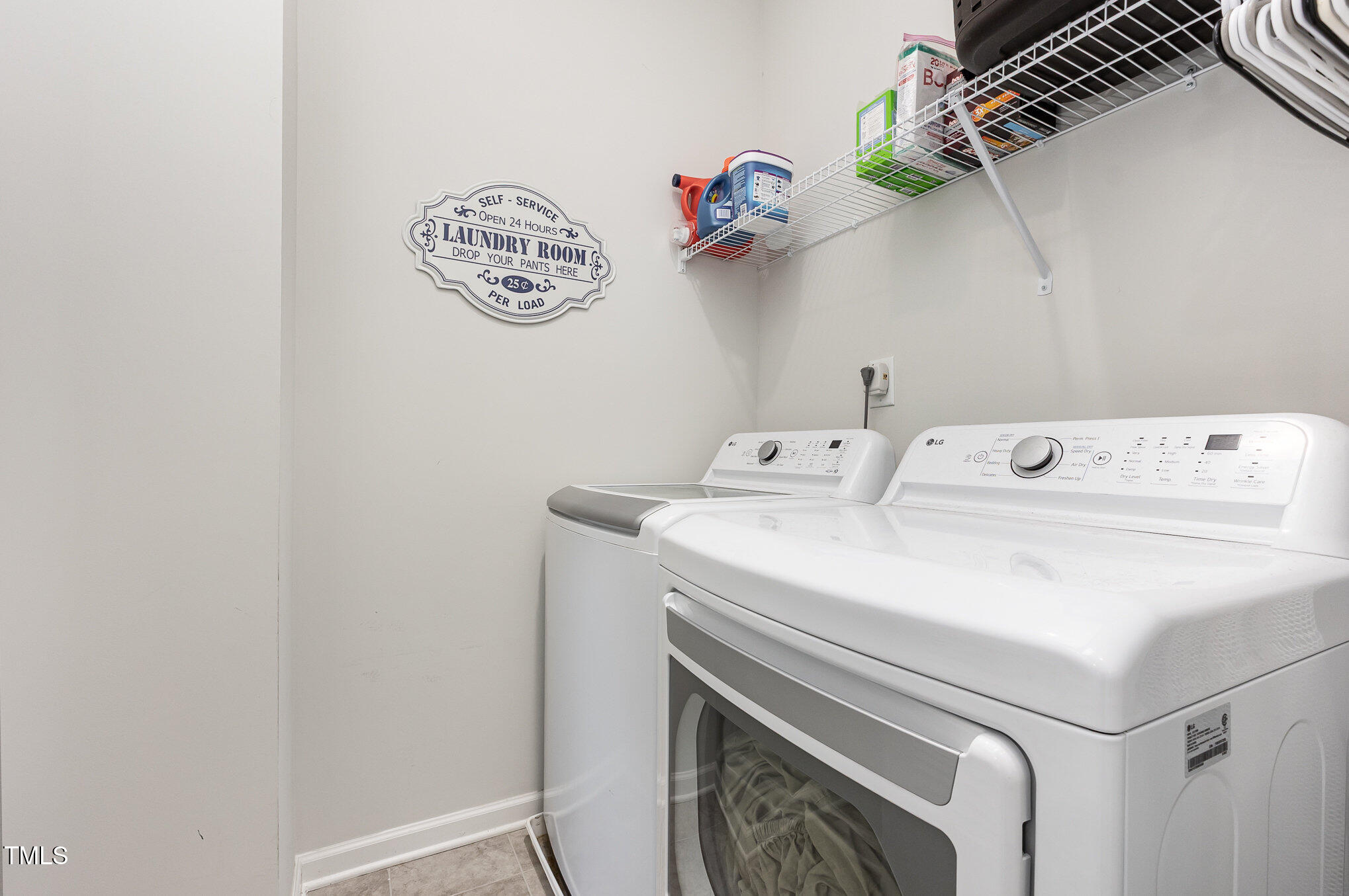 1101 Hazelmist Drive Wake Forest, NC 27587 - Photo 20 of 28 a utility room with dryer and washer