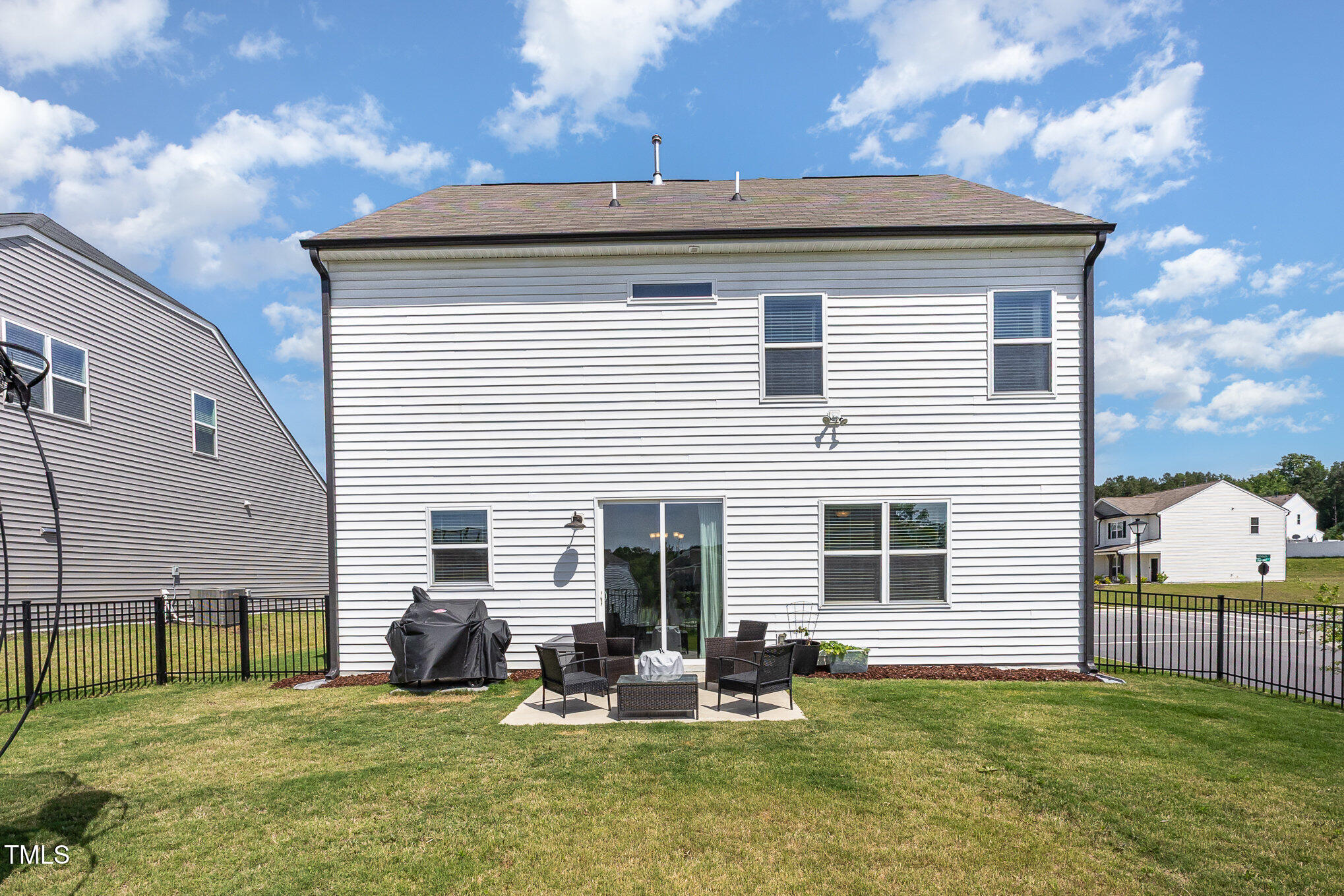 1101 Hazelmist Drive Wake Forest, NC 27587 - Photo 22 of 28 a view of a house with backyard and sitting area