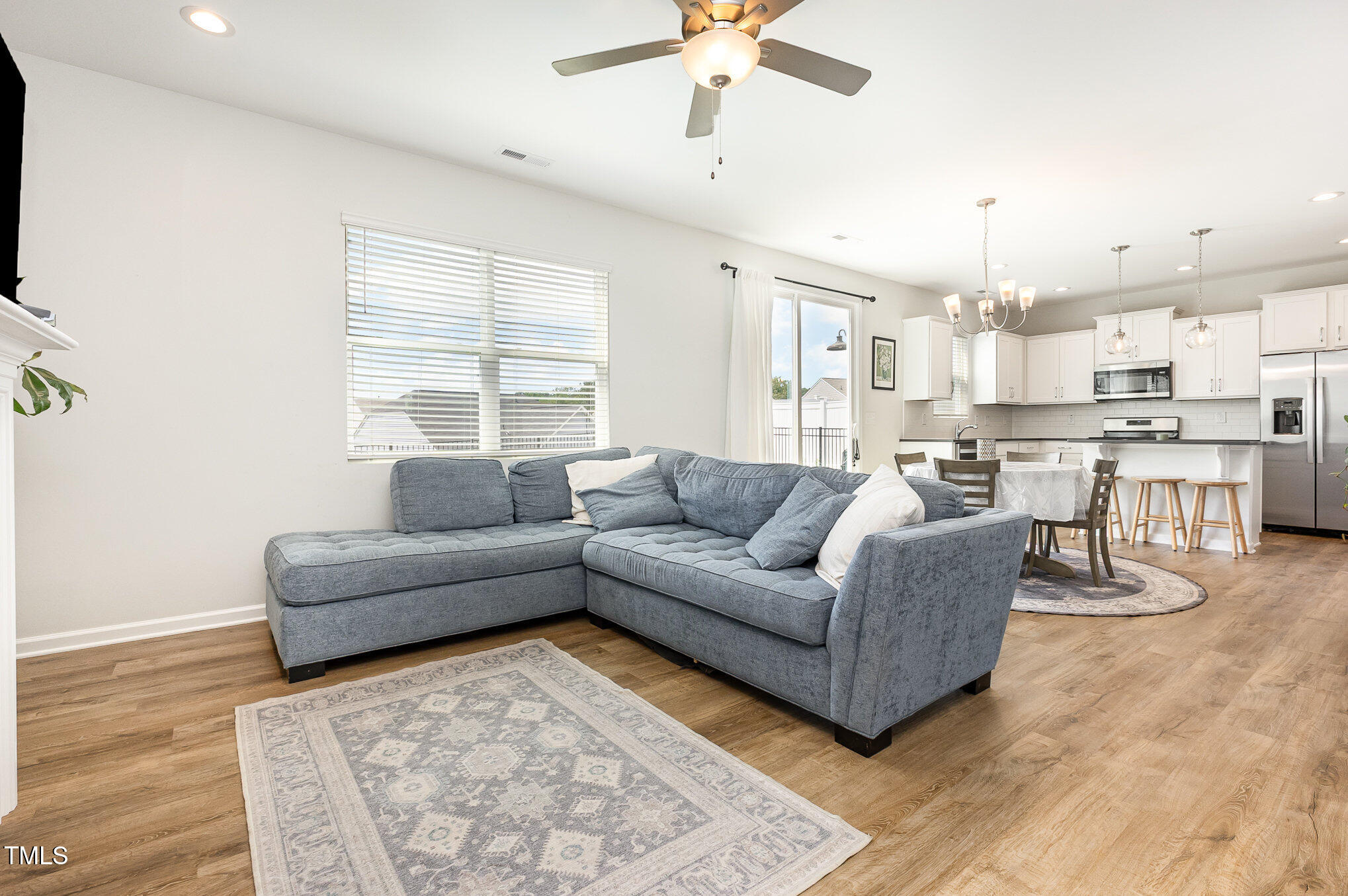1101 Hazelmist Drive Wake Forest, NC 27587 - Photo 5 of 28 a living room with furniture and kitchen view
