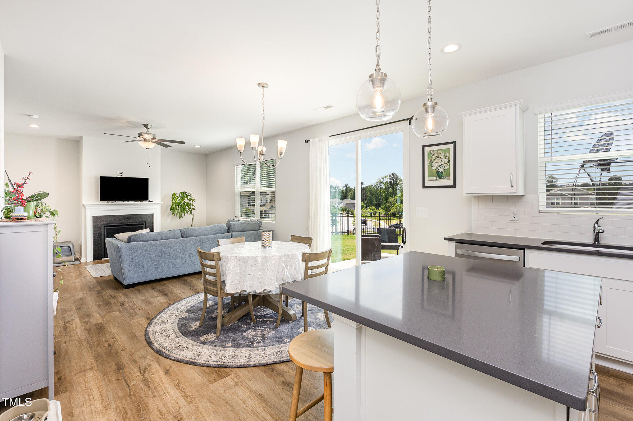 1101 Hazelmist Drive Wake Forest, NC 27587 - Photo 28 of 28 a living room with furniture kitchen view and a large window