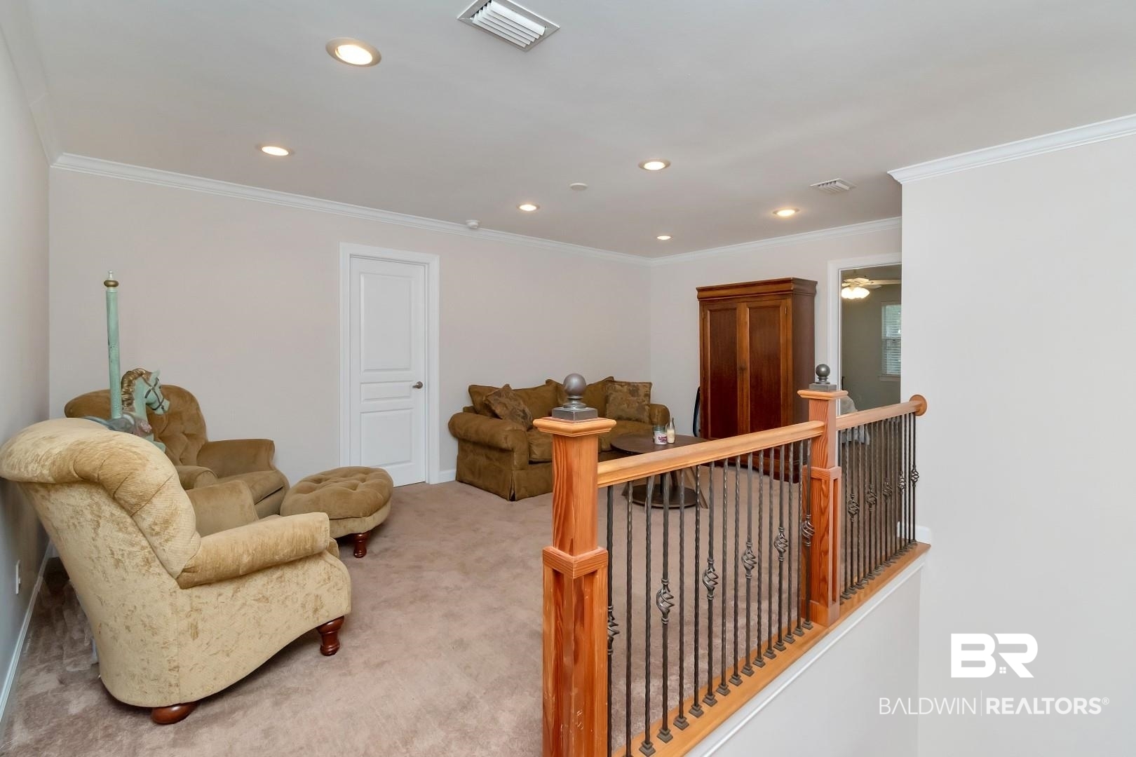 3500 North Riviere Du Chien Loop Mobile, AL 36693 - Photo 28 of 74 Living area featuring carpet flooring and crown molding