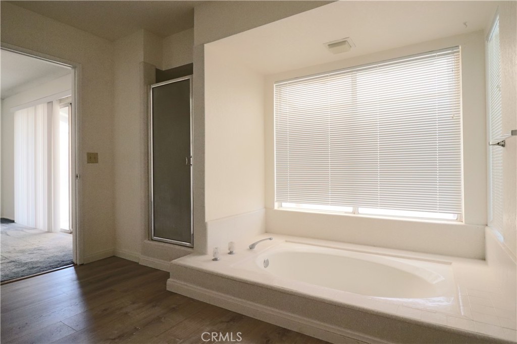 4752 Flying H Road Twentynine Palms, CA 92277 - Photo 38 of 55 a bathroom with a bathtub and a shower
