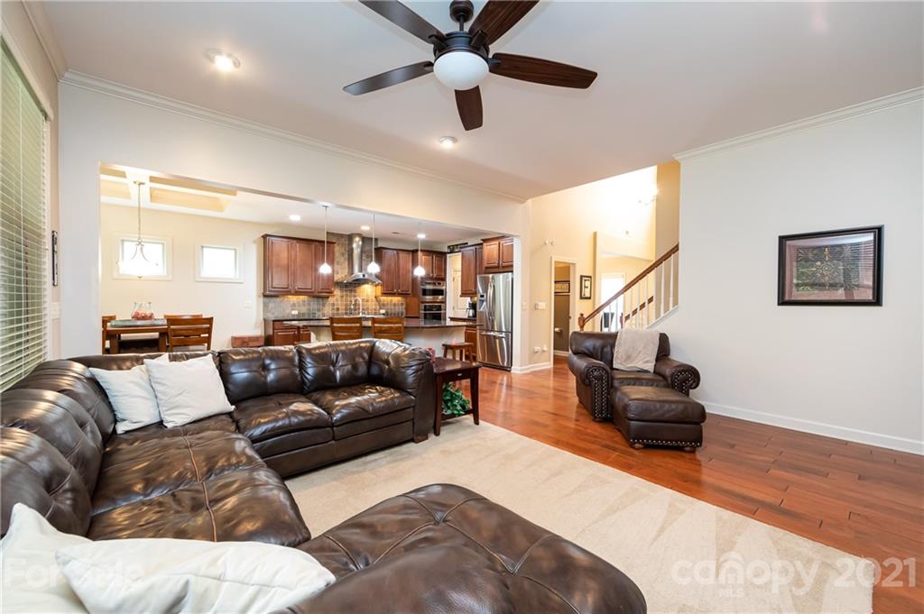 2721 Twinberry Lane Waxhaw, NC 28173 - Photo 11 of 29 a living room with furniture or couch and a ceiling fan