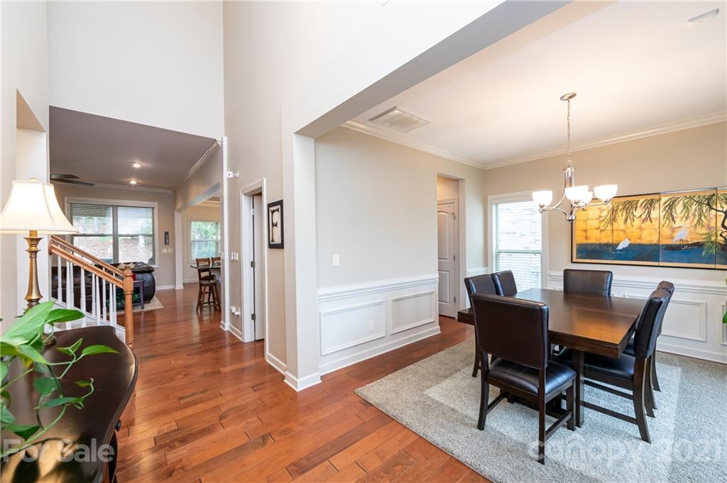 2721 Twinberry Lane Waxhaw, NC 28173 - Photo 14 of 29 a view of a dining room with furniture window and wooden floor