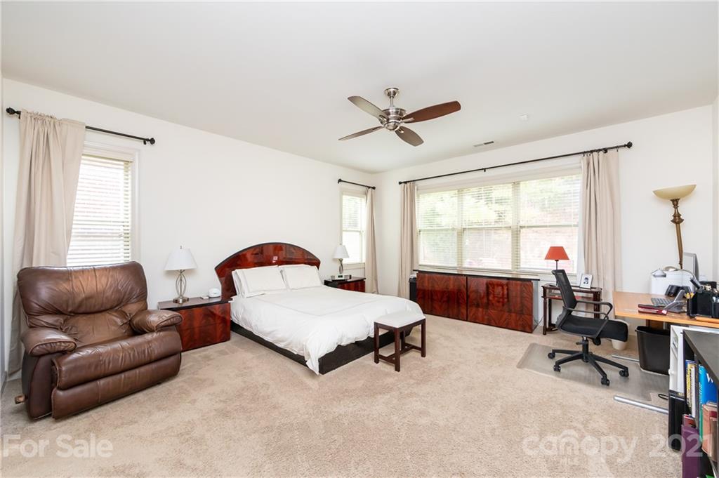 2721 Twinberry Lane Waxhaw, NC 28173 - Photo 19 of 29 a living room with furniture and a window