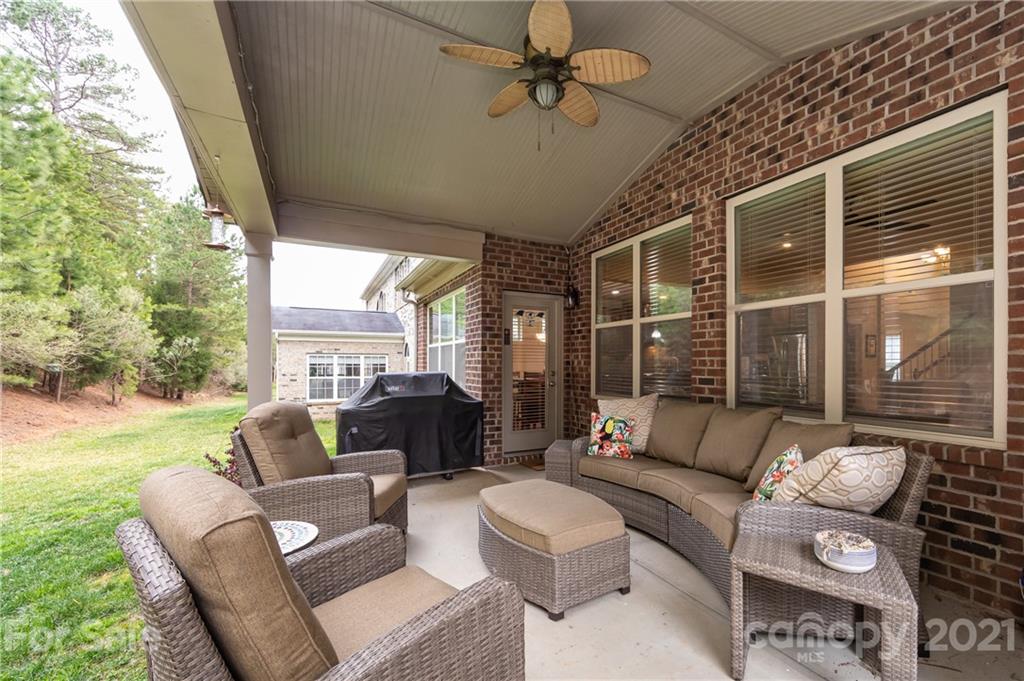 2721 Twinberry Lane Waxhaw, NC 28173 - Photo 28 of 29 a living room with furniture and a large window