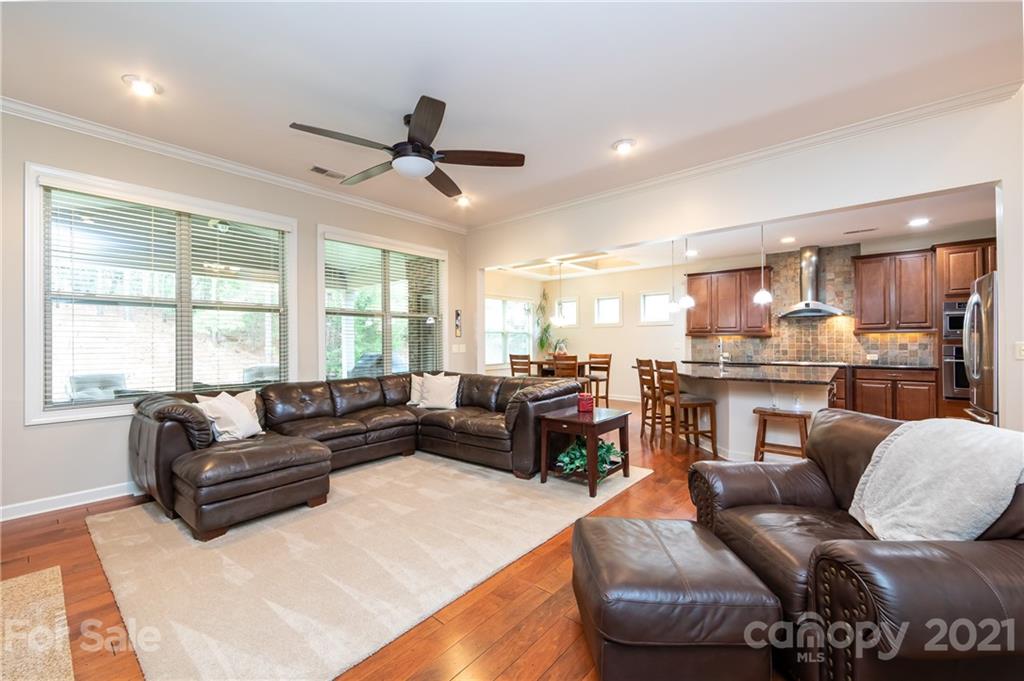 2721 Twinberry Lane Waxhaw, NC 28173 - Photo 9 of 29 a living room with furniture and a large window