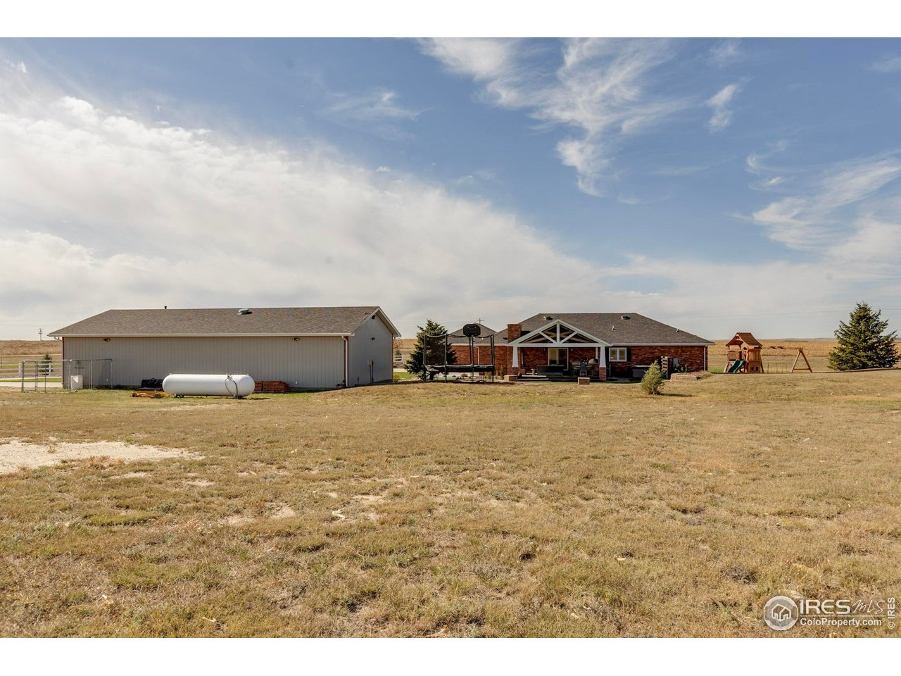 14500 County Road 29 Sterling, CO 80751 - Photo 18 of 49 a view of houses and outdoor space