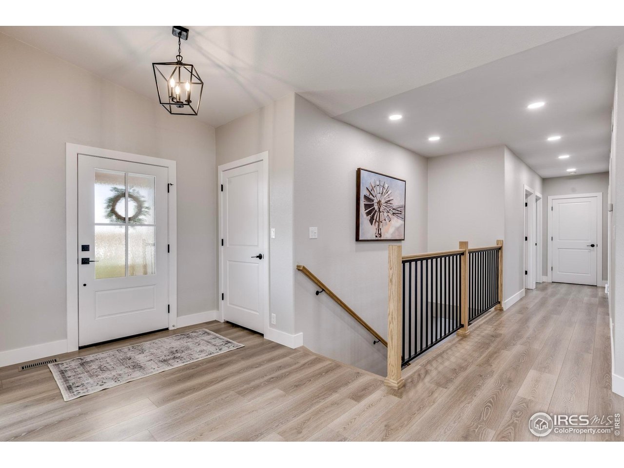 14500 County Road 29 Sterling, CO 80751 - Photo 19 of 49 a view of a hallway with wooden floor