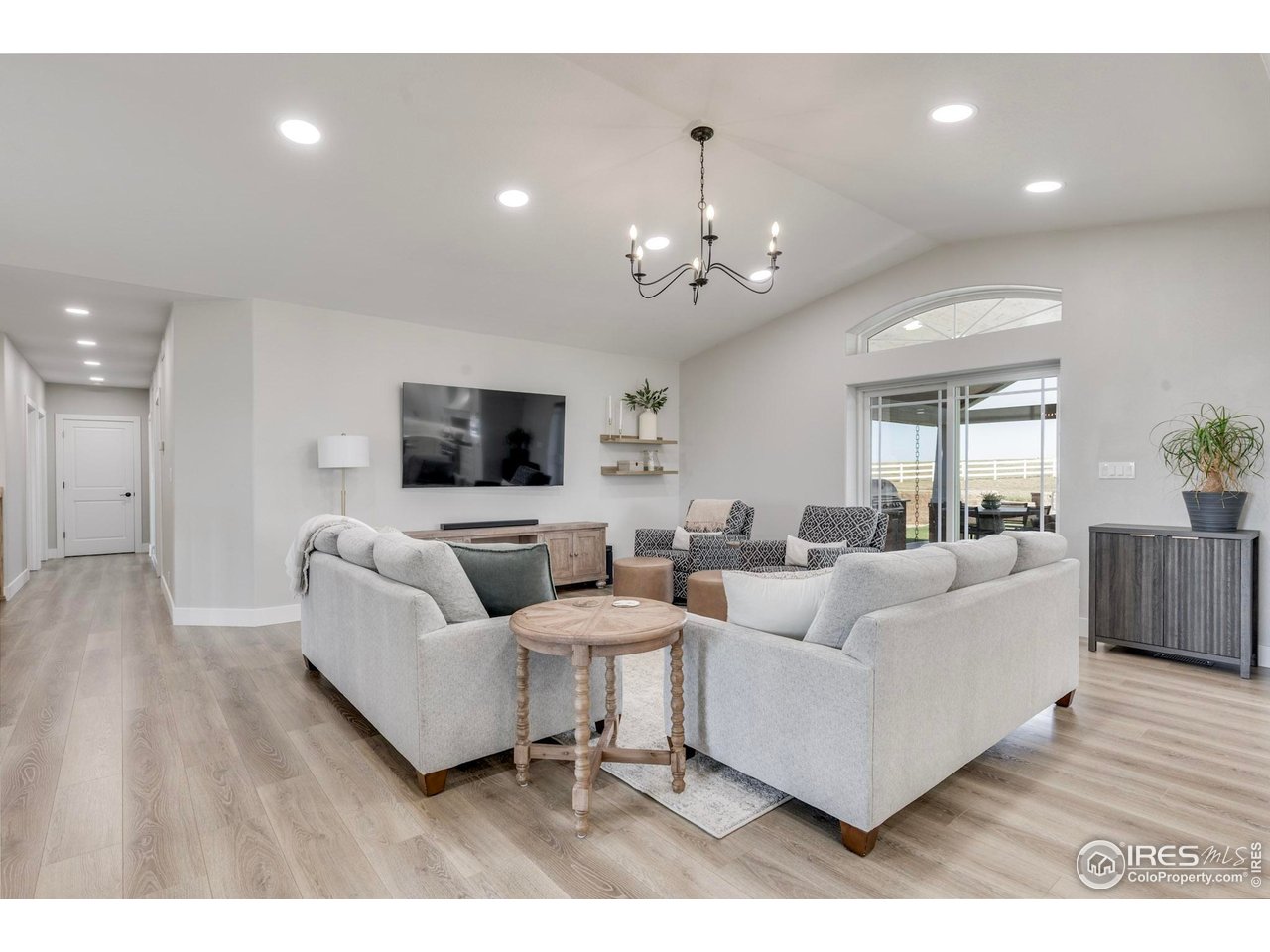 14500 County Road 29 Sterling, CO 80751 - Photo 26 of 49 a living room with furniture and a flat screen tv