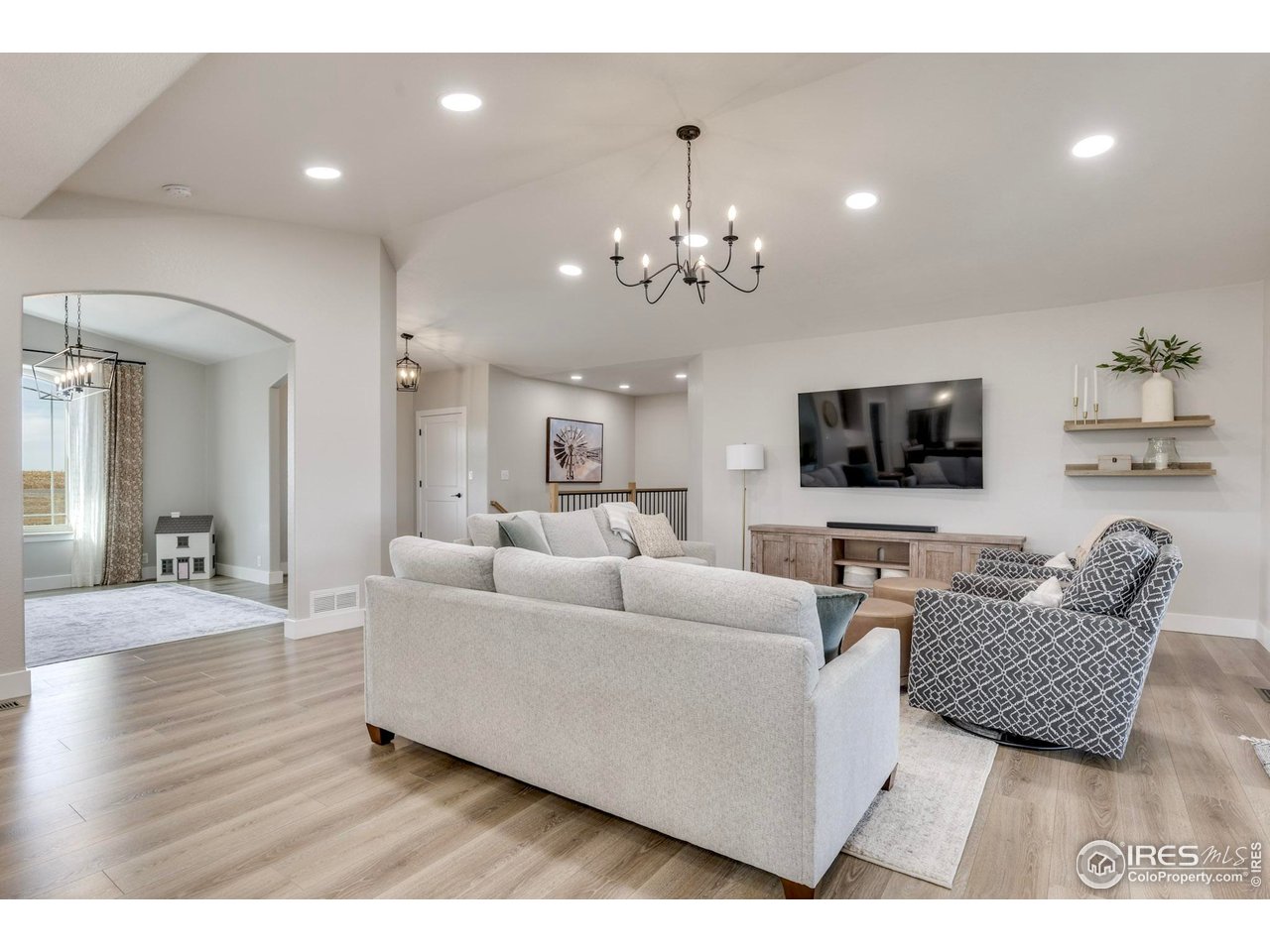 14500 County Road 29 Sterling, CO 80751 - Photo 27 of 49 a living room with furniture and a flat screen tv
