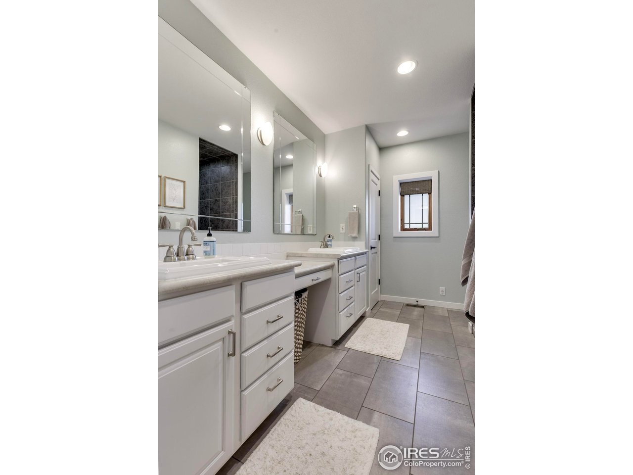 14500 County Road 29 Sterling, CO 80751 - Photo 34 of 49 a bathroom with a sink and a mirror
