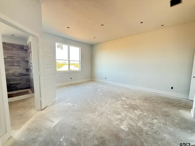 an empty room with windows