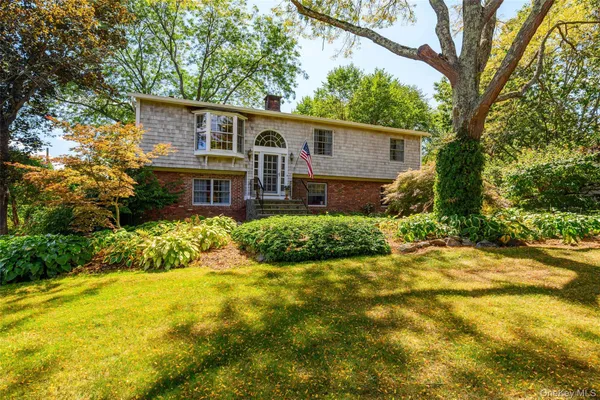 a view of a house with a big yard