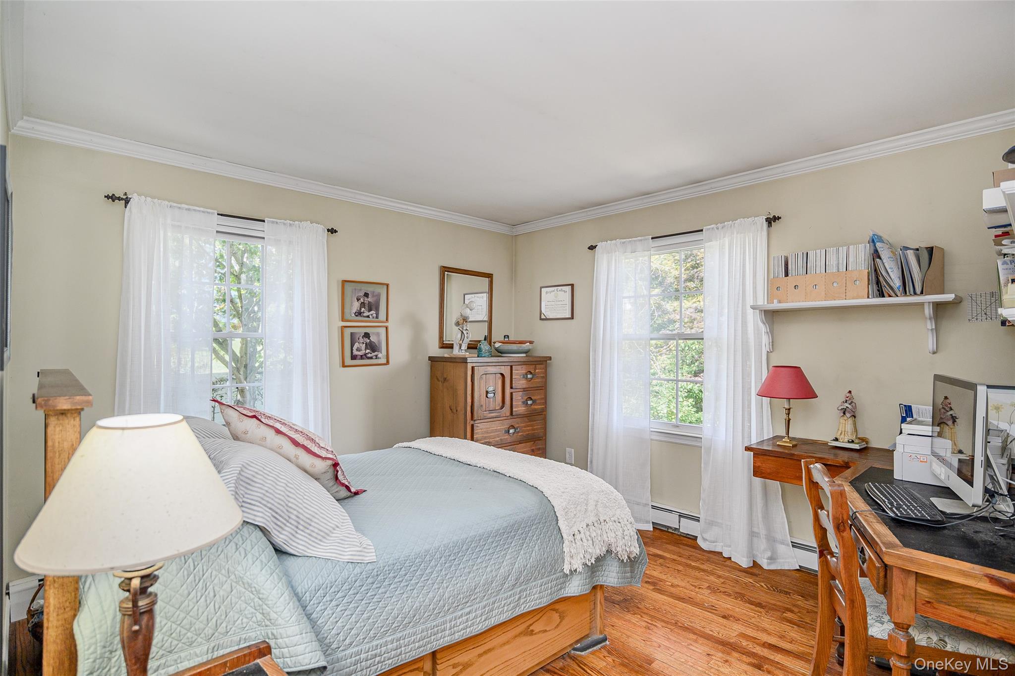 475 Mooney Hill Road Patterson, NY 12563 - Photo 15 of 47 a bedroom with a bed and a bookshelf