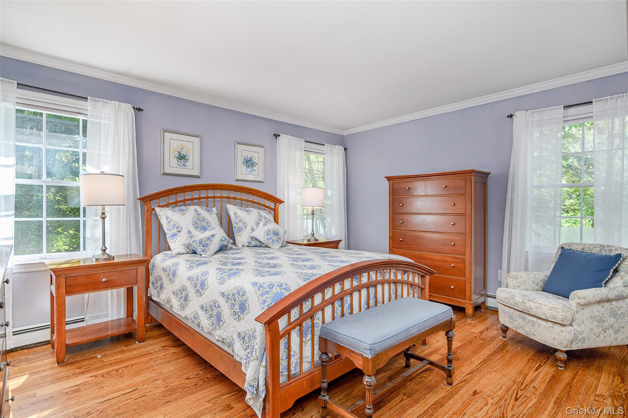 475 Mooney Hill Road Patterson, NY 12563 - Photo 16 of 47 a bedroom with a bed and wooden floor