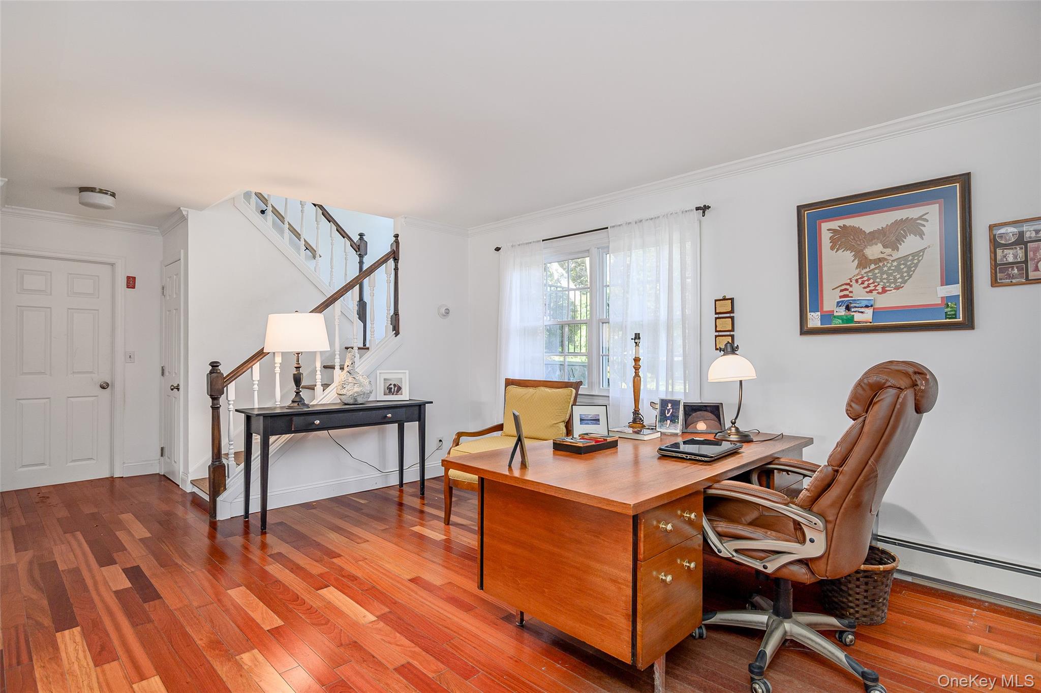 475 Mooney Hill Road Patterson, NY 12563 - Photo 19 of 47 a view of a workspace with furniture and wooden floor