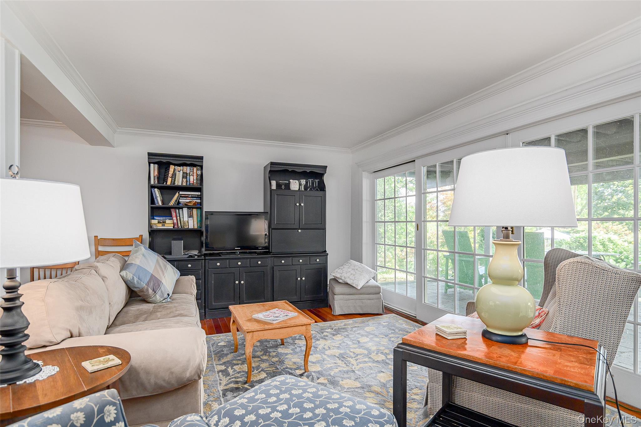 475 Mooney Hill Road Patterson, NY 12563 - Photo 21 of 47 a living room with furniture and a wooden floor