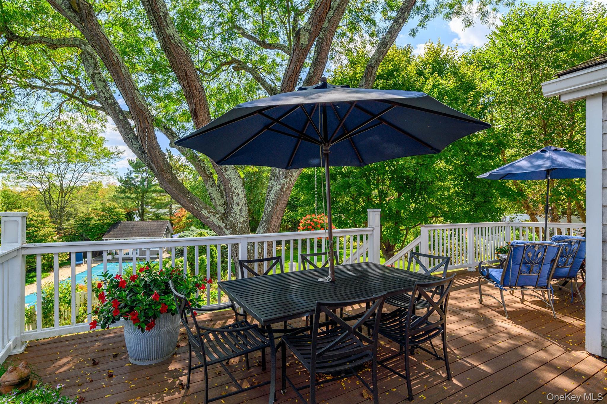 475 Mooney Hill Road Patterson, NY 12563 - Photo 25 of 47 a view of a table and chairs under an umbrella