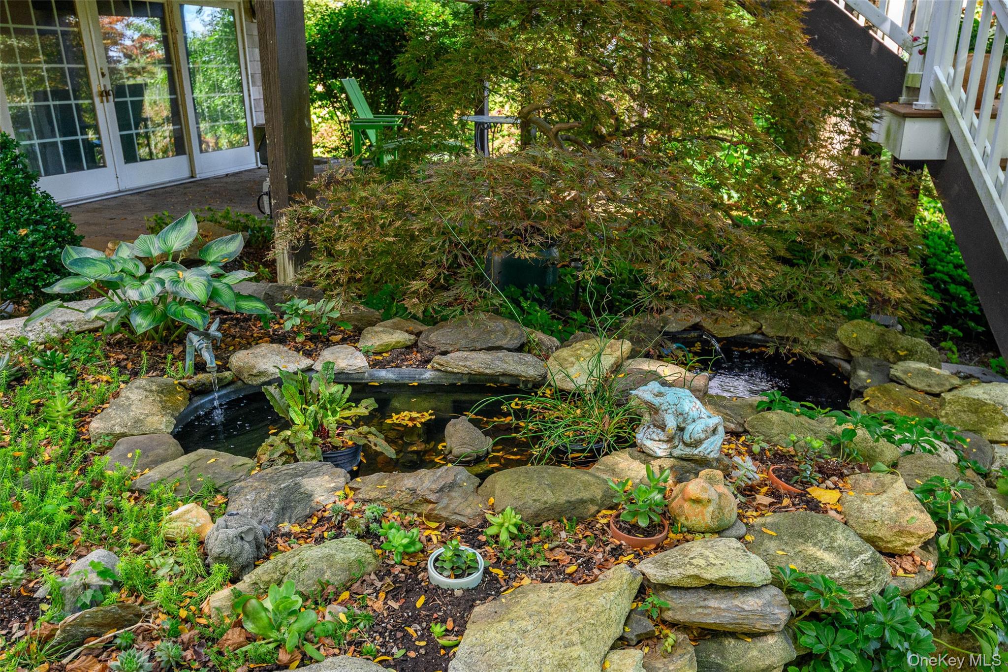 475 Mooney Hill Road Patterson, NY 12563 - Photo 33 of 47 a view of a garden with a tree