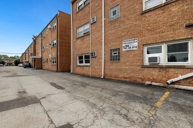 a view of a house with a street