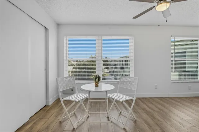 a bed room with a bed and a lamp