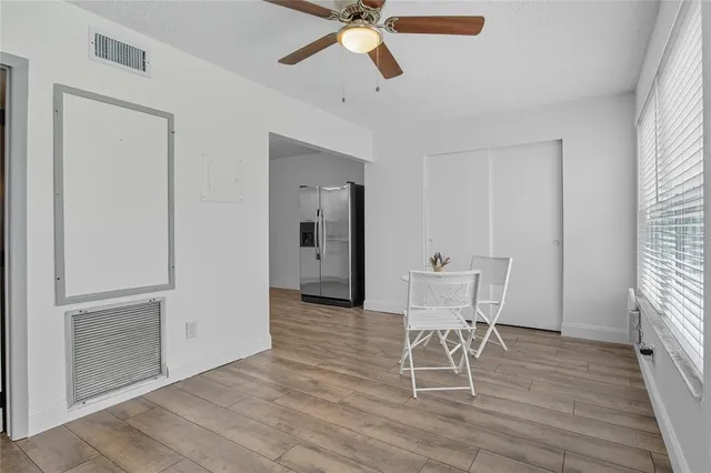 a bathroom with a sink a toilet a shower and a mirror