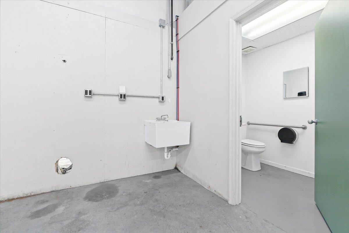 2586 Tuck Road, Unit 1 Moneta, VA 24121 - Photo 14 of 16 a bathroom with a granite countertop sink