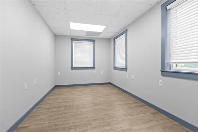 an empty room with windows
