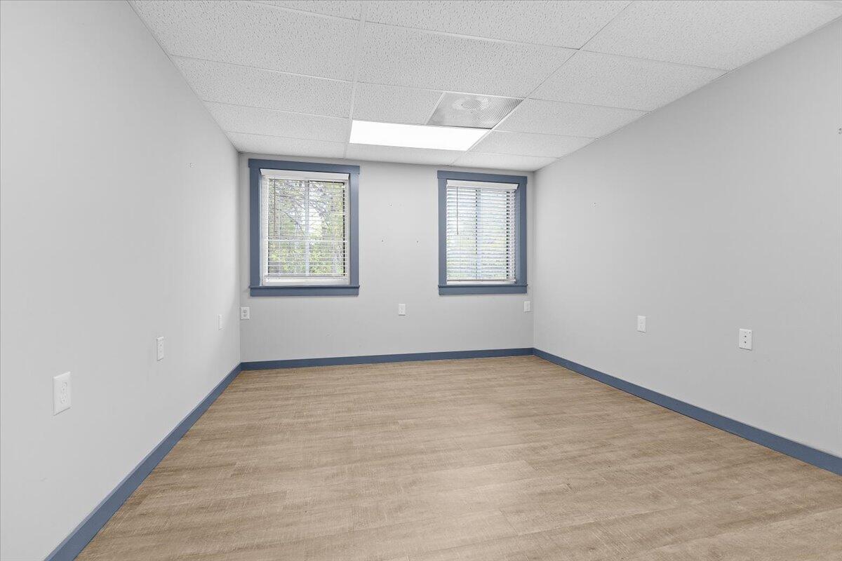2586 Tuck Road, Unit 1 Moneta, VA 24121 - Photo 7 of 16 an empty room with windows