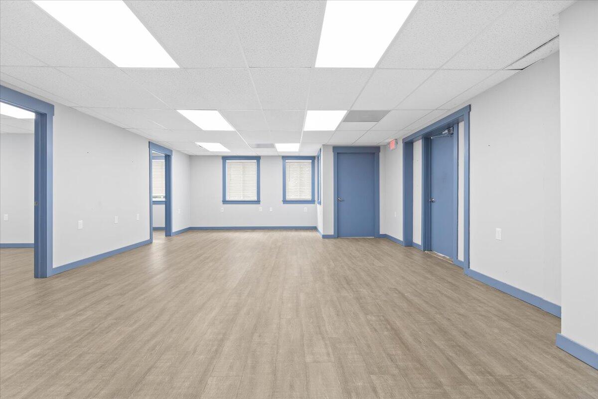 2586 Tuck Road, Unit 1 Moneta, VA 24121 - Photo 9 of 16 a view of an empty room with window and wooden floor