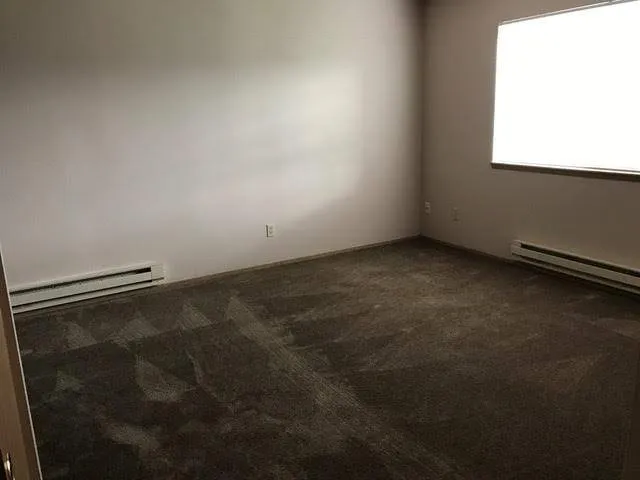 an empty room with a window