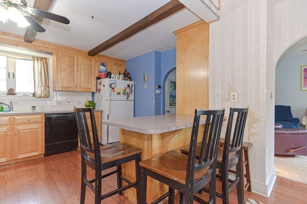 38 Grant Street Milford, MA 01757 - Photo 11 of 42 a dining room with furniture and window