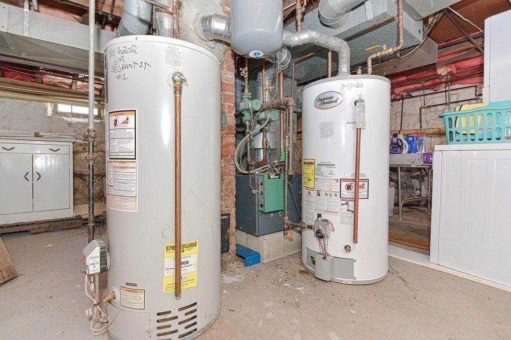 38 Grant Street Milford, MA 01757 - Photo 19 of 42 a utility room with dryer and washer