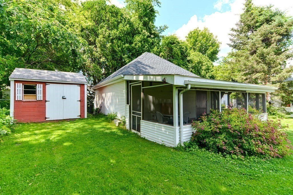 38 Grant Street Milford, MA 01757 - Photo 25 of 42 a front view of a house with a yard and porch