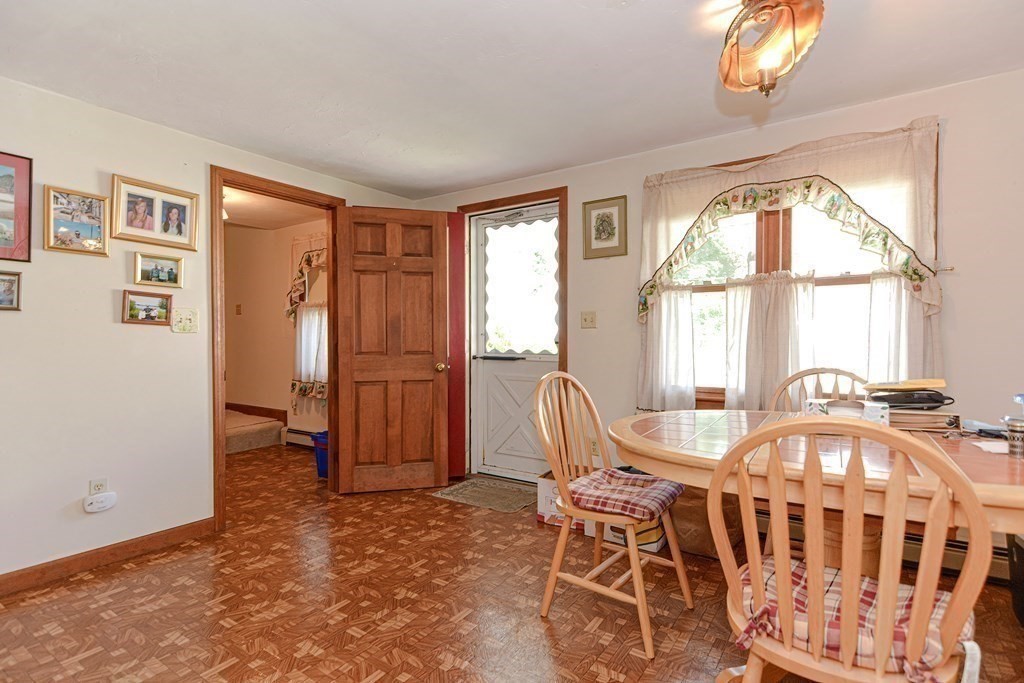 38 Grant Street Milford, MA 01757 - Photo 28 of 42 a view of a livingroom with furniture and a window