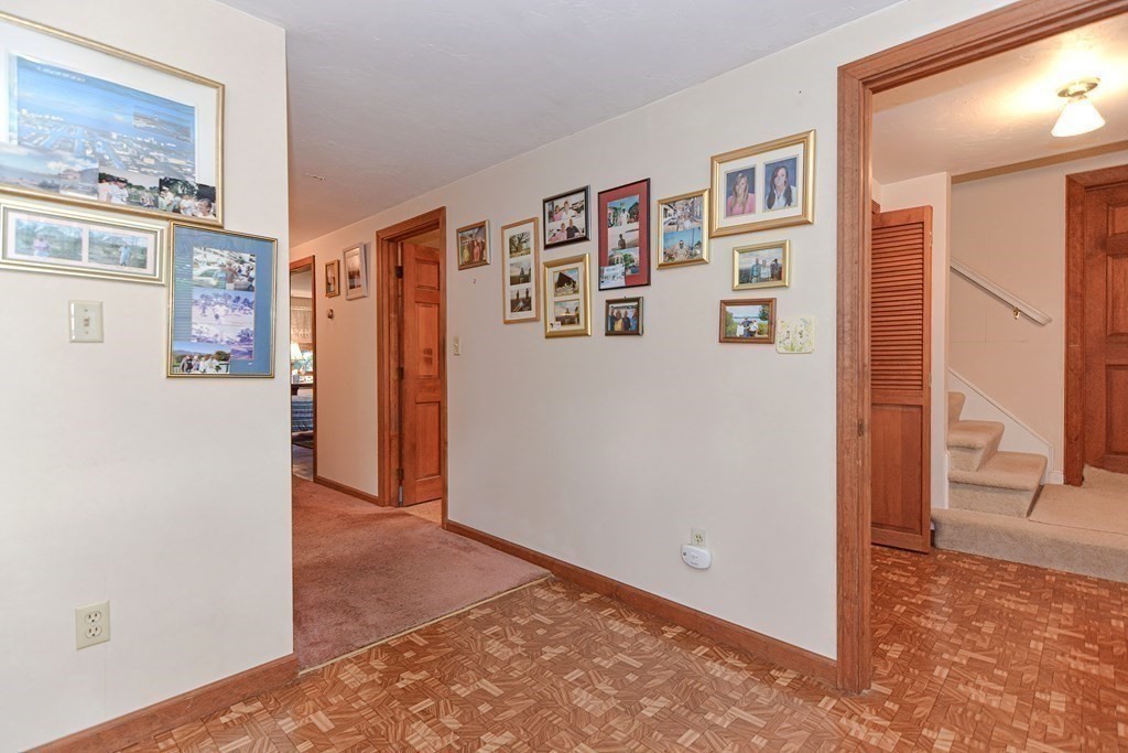 38 Grant Street Milford, MA 01757 - Photo 30 of 42 a view of a bedroom with hallway and refrigerator