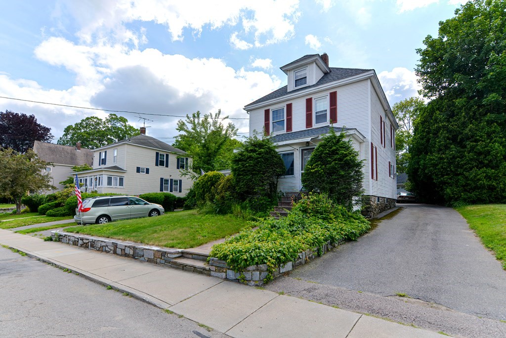 38 Grant Street Milford, MA 01757 - Photo 3 of 42 a front view of house with yard and green space