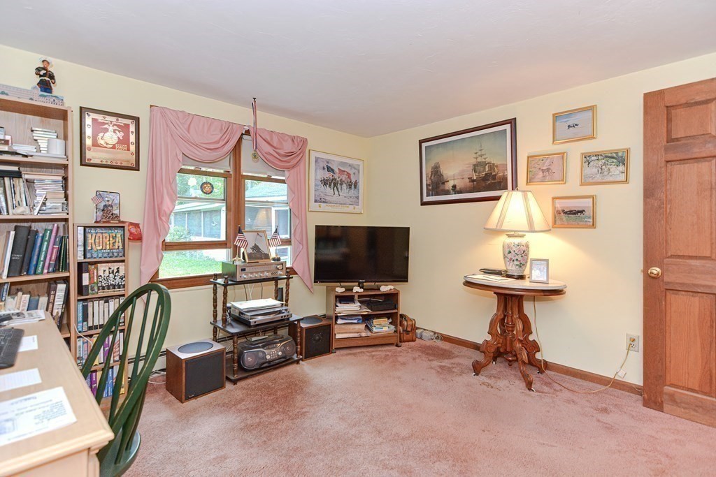 38 Grant Street Milford, MA 01757 - Photo 34 of 42 a view of a livingroom with furniture and a flat screen tv