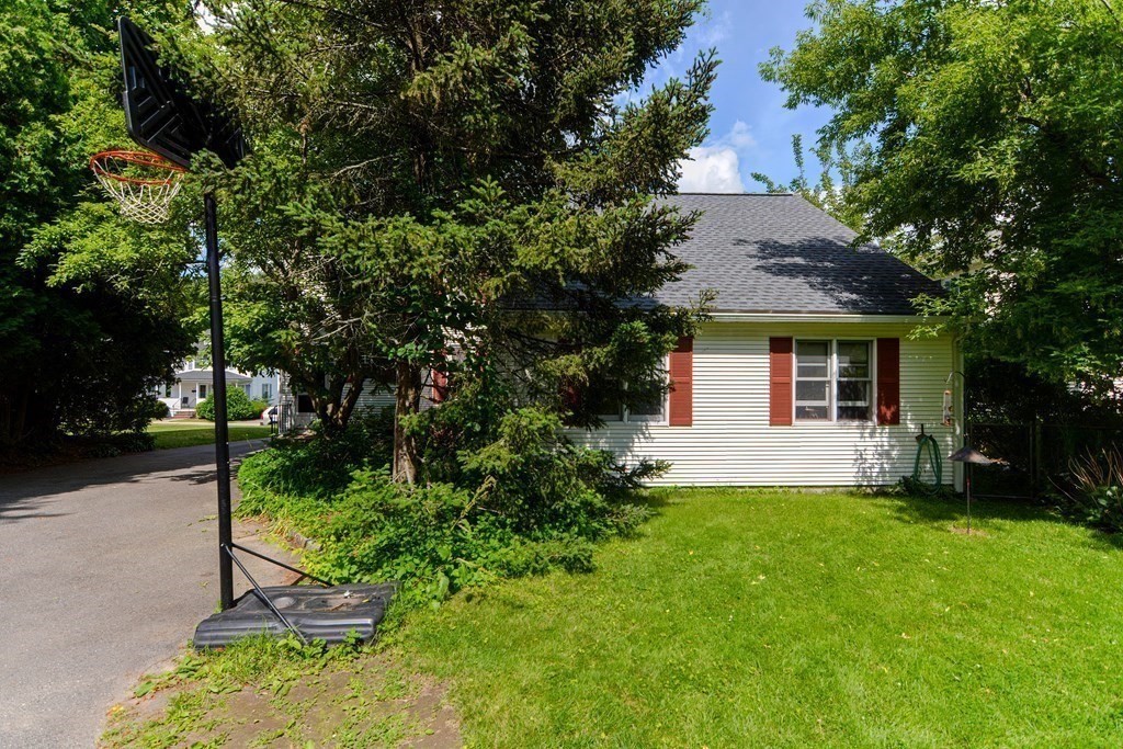 38 Grant Street Milford, MA 01757 - Photo 4 of 42 a view of a house with a yard and tree s
