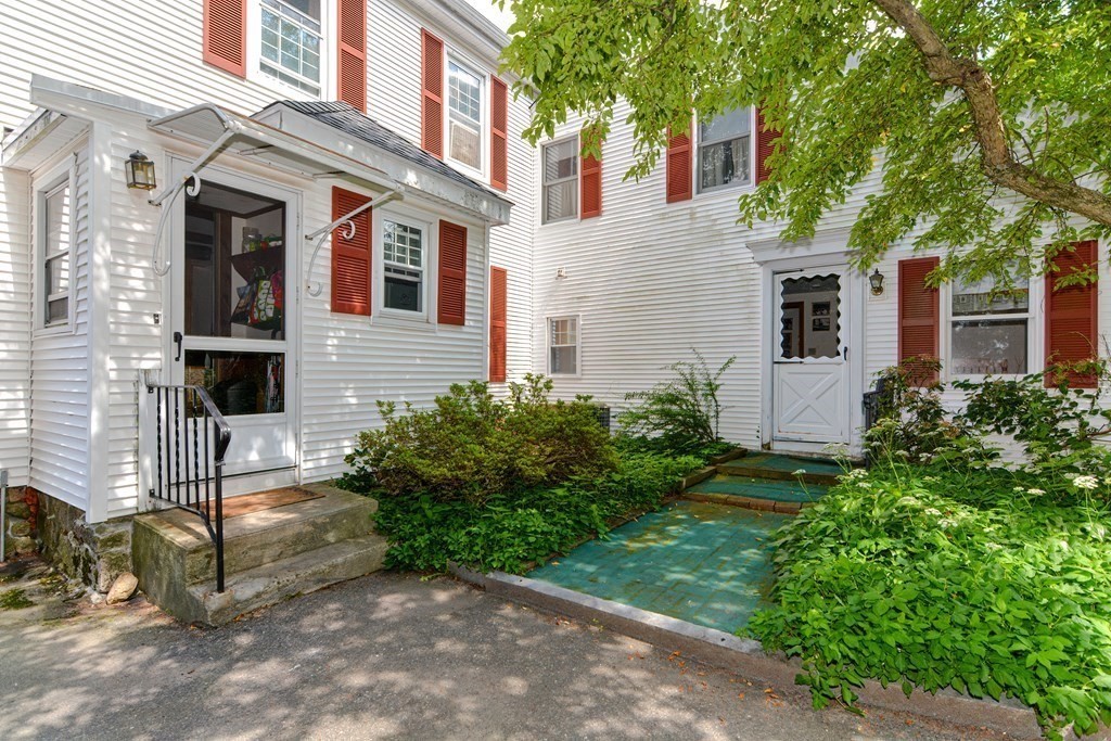 38 Grant Street Milford, MA 01757 - Photo 6 of 42 a front view of a house with garden