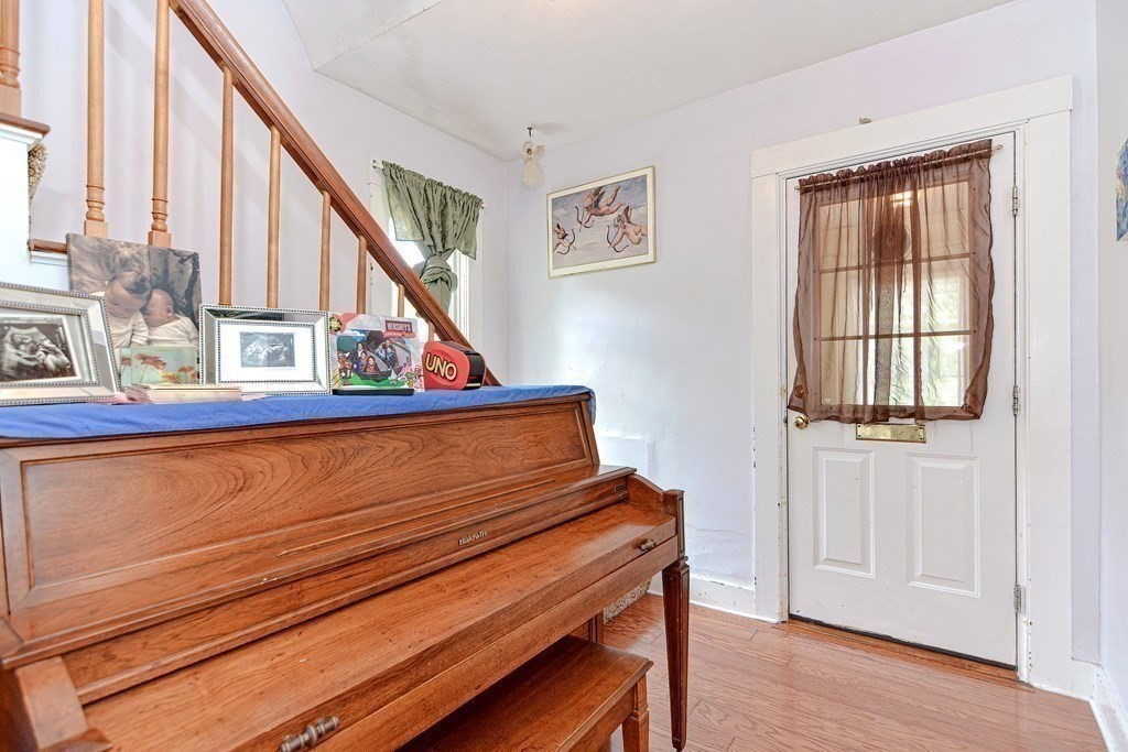 38 Grant Street Milford, MA 01757 - Photo 7 of 42 a view of an entryway with staircase