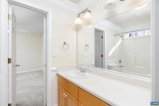 an empty room with a bathroom