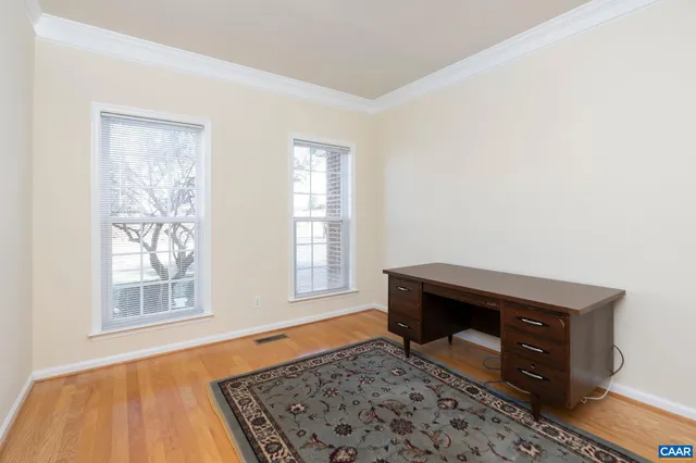 a room with a bed and a window